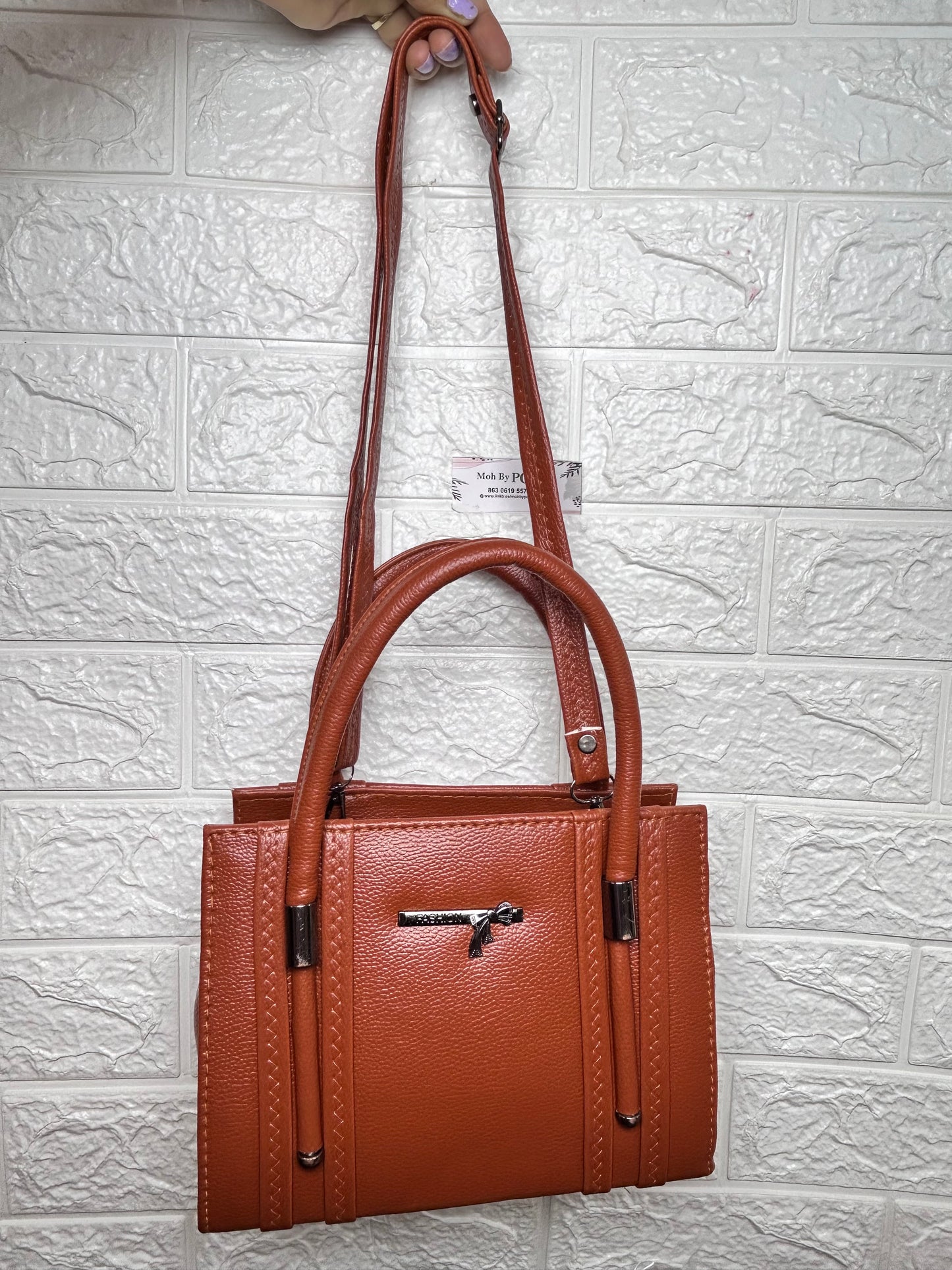 Handbag with sling bag