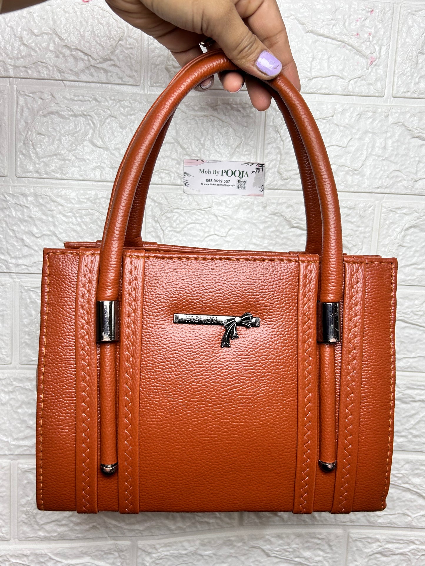 Handbag with sling bag