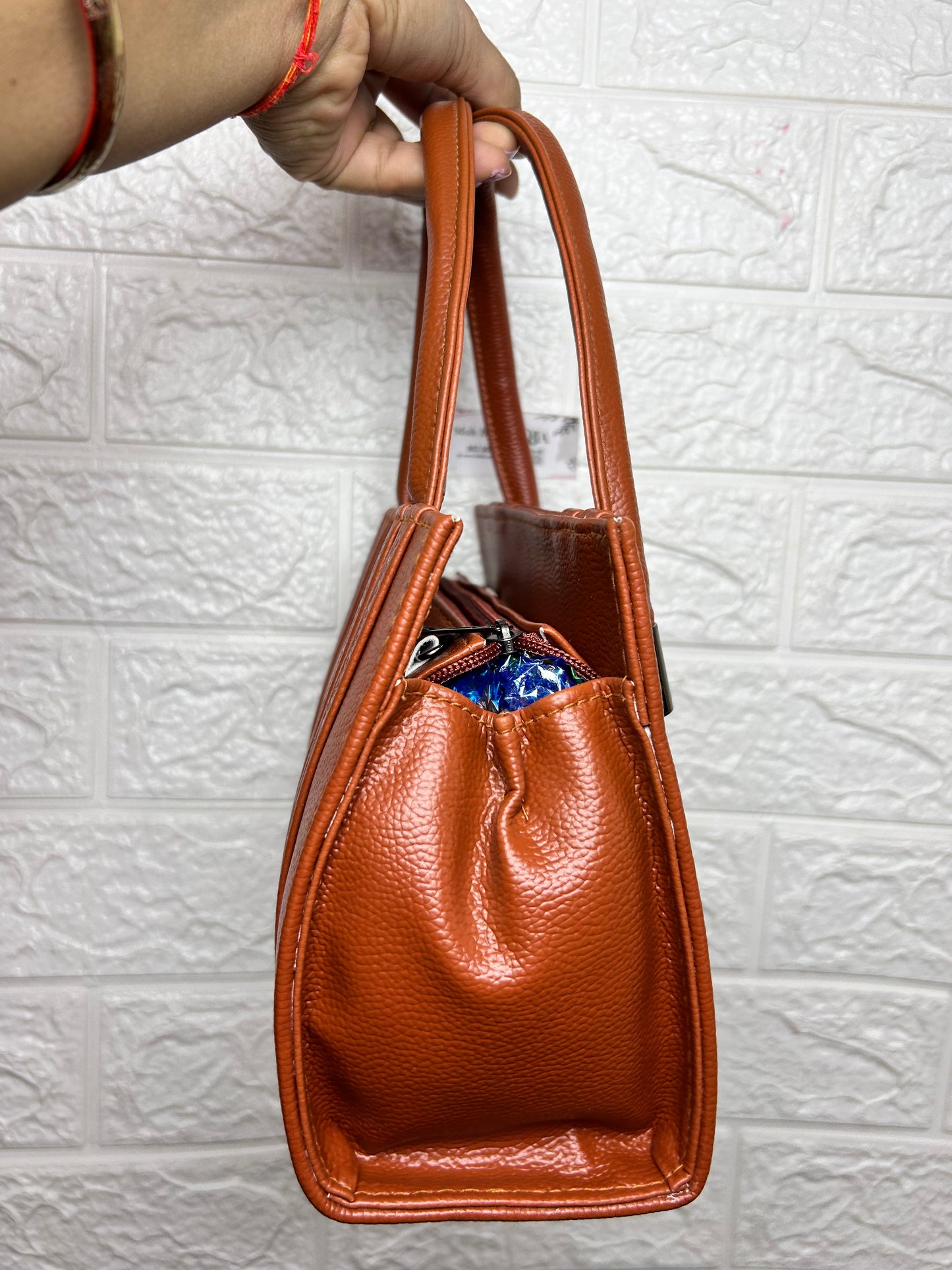 Handbag with sling bag